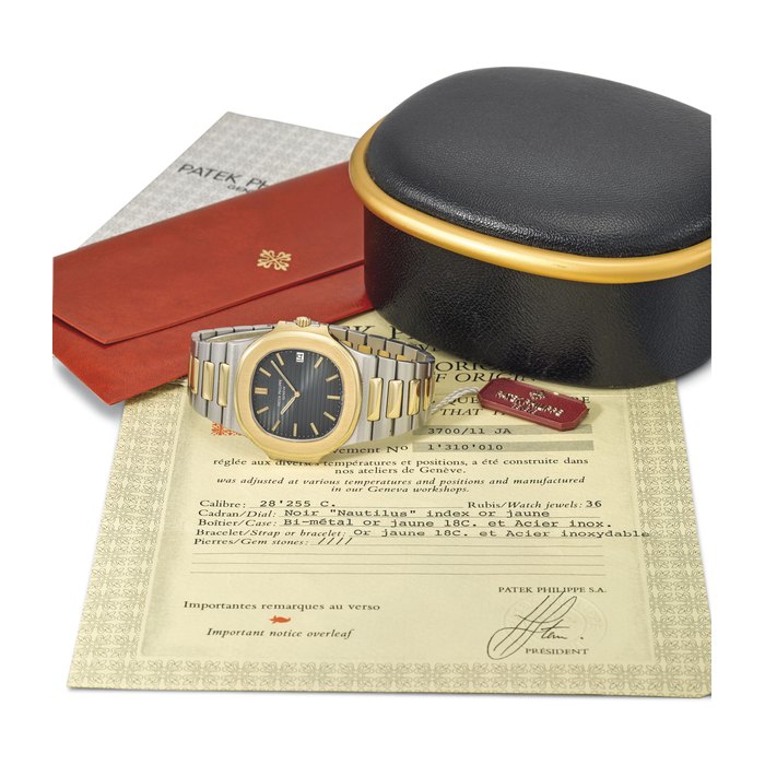 Patek Philippe. A very fine and rare 18K gold and stainless steel automatic wristwatch with date, bracelet, Original Certificate, sales tag and box Signed Patek Philippe, Genève, ref. 3700/11 AJ, movement no. 1’310’010, case no. 2’808’845, circa 1983