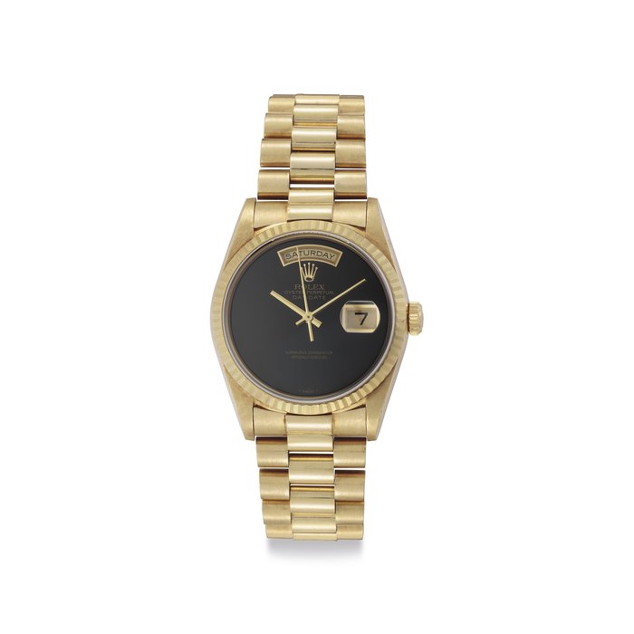 Rolex. A Fine 18k Gold Automatic Wristwatch with Day, Date, Center Seconds, Onyx Dial and Bracelet Signed Rolex, Oyster Perpetual, Day-Date, Ref. 18038, Case No. L432196, Circa 1989