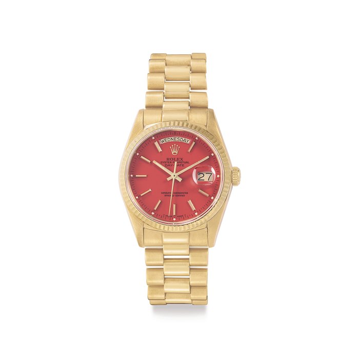 Rolex. A Very Fine 18k Gold Automatic Wristwatch with Day, Date, Center Seconds, Red "Stella" Dial and Bracelet Signed Rolex, Oyster Perpetual, Day-Date, Ref. 18038, Case No. 8'968'230, Circa 1986