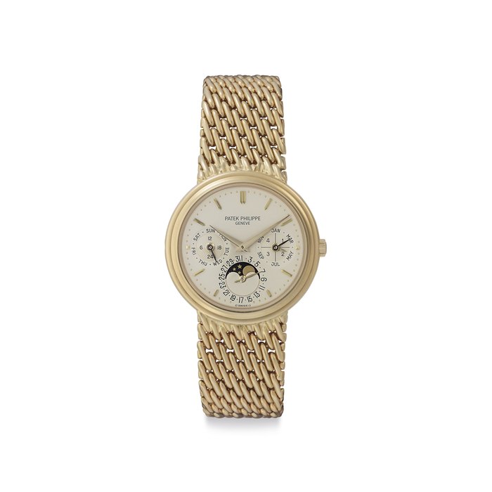 Patek Philippe. An Extremely Fine 18k Gold Automatic Perpetual Calendar Wristwatch with Moon Phases and Bracelet Signed Patek Philippe, Genève, Ref. 3945/1, Movement No. 771'532, Case No. 2'856'684, Manufactured in 1989