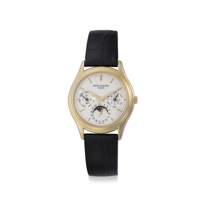 Patek Philippe. A Fine 18k Gold Automatic Perpetual Calendar Wristwatch with Moon Phases Signed Patek Philippe, Genève, Ref. 3940, Movement No. 3'124'420, Case No. 4'087'043, Manufactured 1999