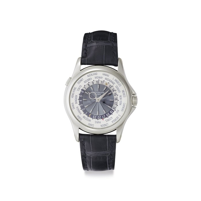 Patek Philippe. A Fine Platinum Automatic World Time Wristwatch Signed Patek Philippe, Genève, Ref. 5130P, Movement No. 5'572'054, Case No. 4'530'925 , Manufactured in 2011
