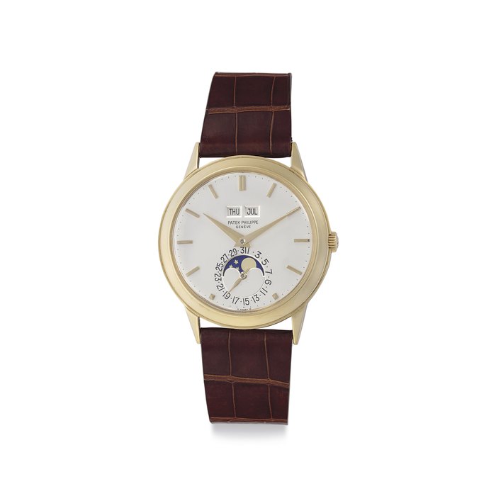 Patek Philippe. A Very Fine and Rare 18k Gold Automatic Perpetual Calendar Wristwatch with Moon Phases Signed Patek Philippe, Genève, Ref. 3448, Movement No. 1'119'318, Case No. 330'586, Manufactured in 1973