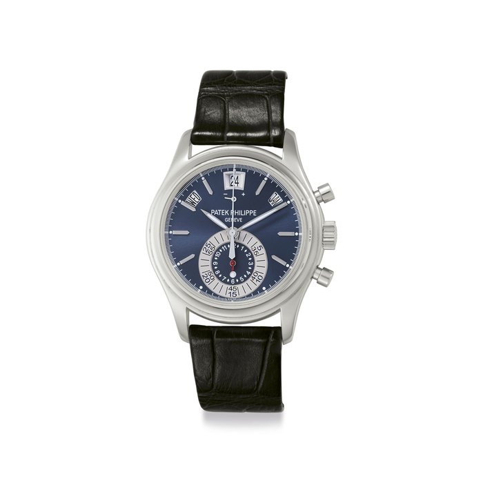 Patek Philippe. A Fine Platinum Automatic Annual Calendar Flyback Chronograph Wristwatch with Day/Night Display and Power Reserve Signed Patek Philippe, Genève, Ref. 5960P-015, Movement No. 5'543'448, Case No. 4'522'965, Manufactured in 2010