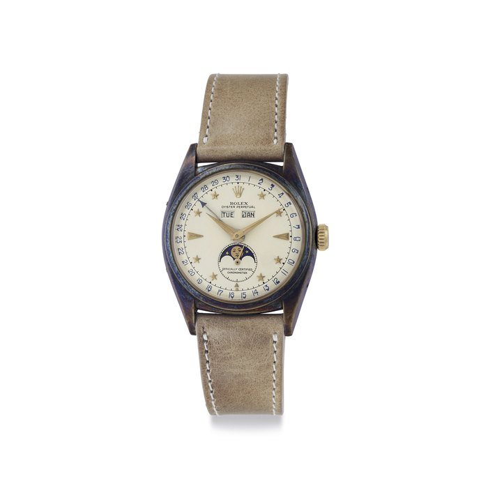 Rolex Rolex. An Extremely Fine, Rare and Attractive 18k Gold Automatic Triple Calendar Wristwatch with Star Dial and Moon Phases Signed Rolex, Oyster Perpetual, Officially Certified Chronometer, Ref. 6062, Case No. 916'321, Circa 1952 · 6062