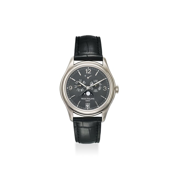 PATEK PHILIPPE. AN EXTREMELY FINE 18K WHITE GOLD ANNUAL CALENDAR AUTOMATIC WRISTWATCH WITH MOON PHASE, POWER RESERVE, ORIGINAL CERTIFICATE AND BOX SIGNED PATEK PHILIPPE, GENEVE, REF. 5146G-010, MOVEMENT NO. 5’729’875, CASE NO. 4’640’779, CIRCA 2013