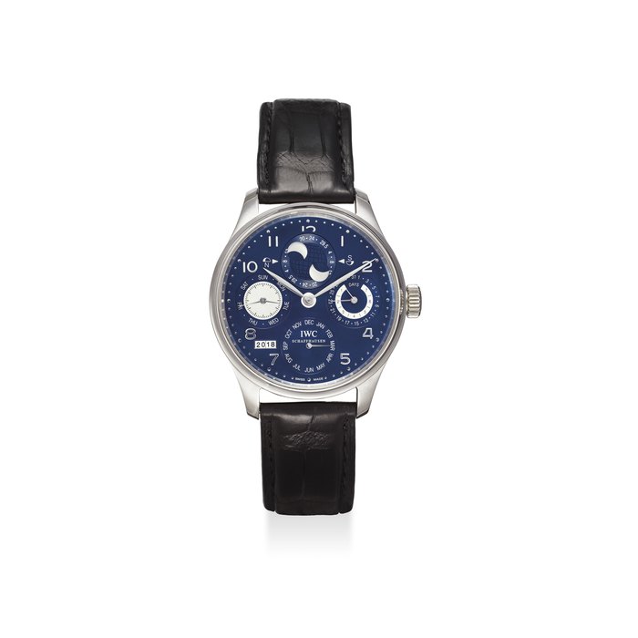 Iwc IWC. A FINE AND LARGE 18K WHITE GOLD AUTOMATIC PERPETUAL CALENDAR WRISTWATCH WITH 7-DAYS POWER RESERVE, DIGITAL YEAR DISPLAY AND MOON PHASES WITH ORIGINAL WARRANTY, REPLACEMENT CALENDAR AND BOX SIGNED IWC, SCHAFFHAUSEN, PORTUGUESE PERPETUAL CALENDAR MODEL, REF. 5022, MOVEMENT NO. 3’745’220, CASE NO. 3’916’349, CIRCA 2010, Price & Market Data