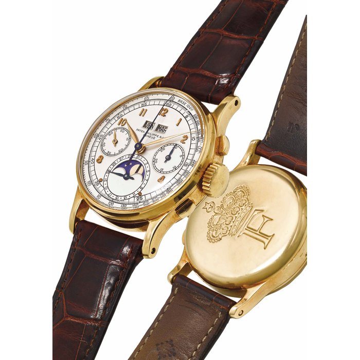PATEK PHILIPPE. AN EXTREMELY FINE, RARE AND HISTORICALLY IMPORTANT 18K GOLD PERPETUAL CHRONOGRAPH WRISTWATCH WITH MOON PHASES SIGNED PATEK PHILIPPE & CO., GENEVE, REF. 1518, MOVEMENT NO. 863’473, CASE NO. 636’428, MANUFACTURED IN 1944