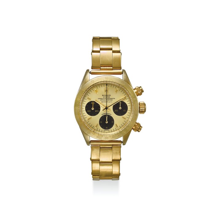 ROLEX. A VERY FINE AND RARE 14K YELLOW MANUAL WINDING CHRONOGRAPH WRISTWATCH WITH BRACELET, SIGNED TIFFANY & CO SIGNED ROLEX, OYSTER CHRONOMETER OFFICIALLY CERTIFIED COSMOGRAPH MODEL, REF.6265, MOVEMENT NO. 1464, CASE NO. 3’607’185, CIRCA 1974