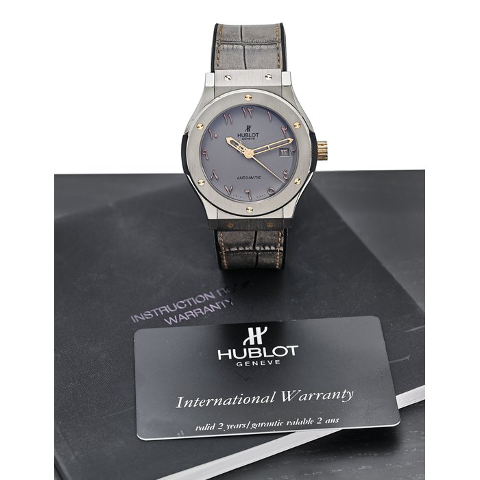 HUBLOT. AN EXTREMELY FINE, TITANIUM AND 18K PINK GOLD LIMITED EDITION AUTOMATIC WRISTWATCH WITH DATE, ORIGINAL CERTIFICATE AND BOX SIGNED HUBLOT, GENEVE, CLASSIC FUSION, THE VISION II MODEL, NO. 049/100, REF. 511’NX’5710’LR’SDQ12, CASE NO. 966’823, CIRCA 2013.