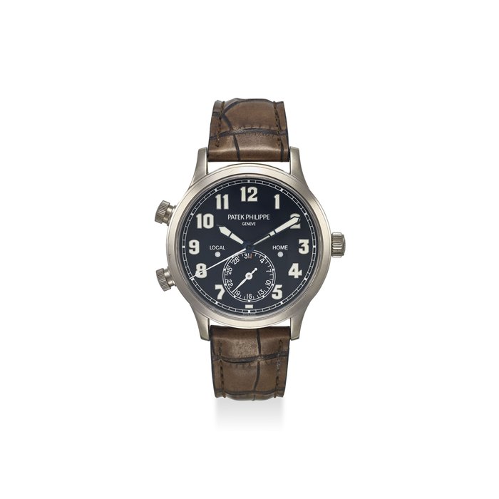 PATEK PHILIPPE. AN EXTREMELY FINE 18K WHITE GOLD AUTOMATIC TRAVEL TIME WRISTWATCH WITH ORIGINAL CERTIFICATE AND BOX SIGNED PATEK PHILIPPE, GENEVE, REF. 5524G-001, MOVEMENT NO. 5923069, CASE NO. 6096665, CIRCA 2016