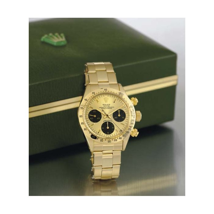 Rolex ROLEX. A RARE 14K GOLD CHRONOGRAPH WRISTWATCH WITH BRACELET SIGNED ROLEX, OYSTER COSMOGRAPH, MOVEMENT NO. 1465727, CASE NO. 6060428, REF. 6265, CIRCA 1980, Price & Market Data