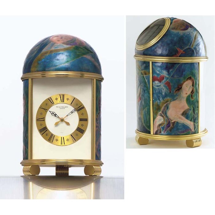PATEK PHILIPPE. A FINE AND POSSIBLY UNIQUE GILT BRASS AND ENAMEL SOLAR-POWERED TABLE CLOCK SIGNED PATEK PHILIPPE, GENEVE, "DÔME", MOVEMENT NO. 874530, REF. 772, CIRCA 1975