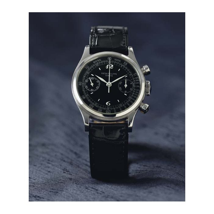 Patek Philippe PATEK PHILIPPE. A FINE AND RARE STAINLESS STEEL WATER-RESISTANT CHRONOGRAPH WRISTWATCH SIGNED PATEK PHILIPPE, GENEVE, MOVEMENT NO. 863153, CASE NO. 640560, REF. 1463, MANUFACTURED IN 1943. · 1463