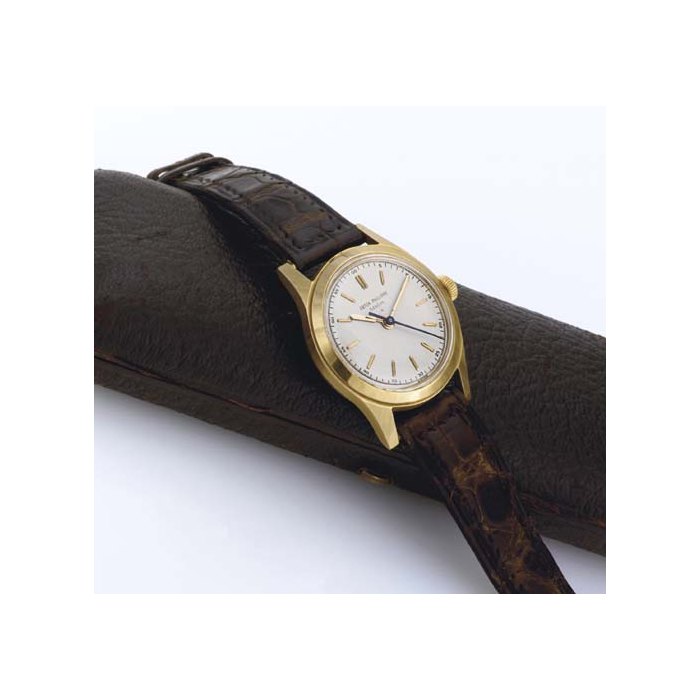 PATEK PHILIPPE. A RARE 18K GOLD WATER-RESISTANT WRISTWATCH WITH CENTER SECONDS SIGNED PATEK PHILIPPE, GENEVE, MOVEMENT NO. 703198, CASE NO. 674875, REF. 2483, MANUFACTURED IN 1954