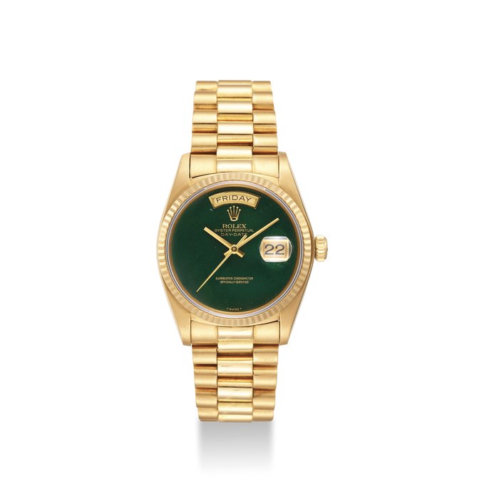 ROLEX. A FINE AND VERY RARE 18K GOLD AUTOMATIC WRISTWATCH WITH JASPER HARD STONE DIAL, SWEEP CENTRE SECONDS, DAY AND DATE SIGNED ROLEX, SIGNED ROLEX, OYSTER PERPETUAL, DAY-DATE, SUPERLATIVE CHRONOMETER, OFFICIALLY CERTIFIED, REF. 18038, CASE NO. 5’802’147, CIRCA 1979