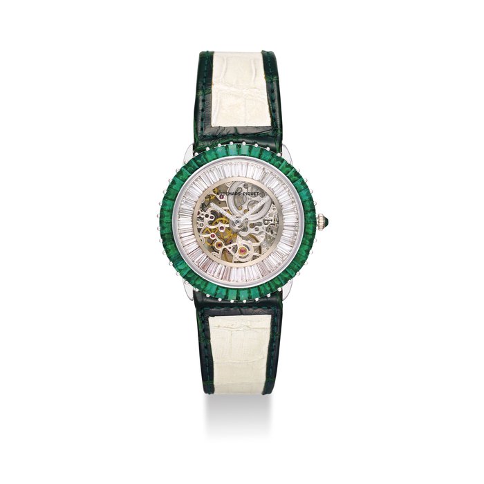 AUDEMARS PIGUET. AN EXCEPTIONALLY FINE AND VERY RARE, POSSIBLY UNIQUE, 18K WHITE GOLD SKELETONIZED WRISTWATCH SET WITH EMERALDS AND DIAMONDS SIGNED AUDEMARS PIGUET, REF. 14879BC, MOVEMENT NO. 345’552, CASE NO. D-47263 NO. 1, CIRCA 1994
