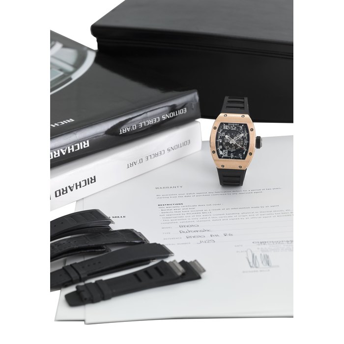 RICHARD MILLE. AN EXTREMELY FINE AND RARE 18K PINK GOLD TONNEAU-SHAPED AUTOMATIC SKELETONISED WRISTWATCH WITH SWEEP CENTRE SECONDS, DATE, CERTIFICATE OF OPRIGIN AND BOX SIGNED RICHARD MILLE, REF RM010 AH RG, MOVEMENT NO. 039’525, CASE NO. 1429, CIRCA 2007