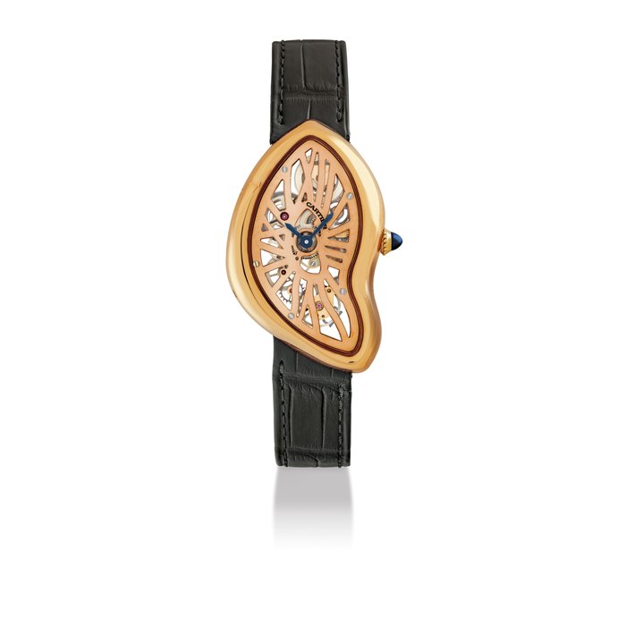 CARTIER. A FINE AND VERY RARE LIMITED EDITION 18K PINK GOLD SKELETONISED ASYMMETRICAL WRISTWATCH WITH CERTIFICATE AND BOX SIGNED CARTIER, CRASH SQUELETTE MODEL, NO. 08/67, CASE NO. 3852, CIRCA 2016