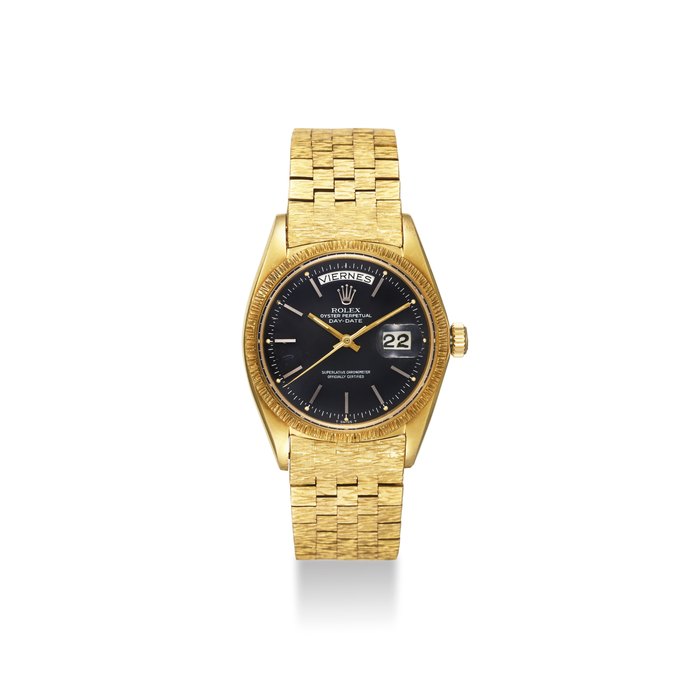 ROLEX. A VERY FINE AND RARE 18K GOLD AUTOMATIC WRISTWATCH WITH GREY MATTE DIAL, SWEEP CENTRE SECONDS, DAY, DATE, BIG LOGO BRACELET AND BOX SIGNED ROLEX, OYSTER PERPETUAL, DAY-DATE, SUPERLATIVE CHRONOMETER, OFFICIALLY CERTIFIED, REF. 1807/1803, CASE NO. 8’030’79, CIRCA 1962