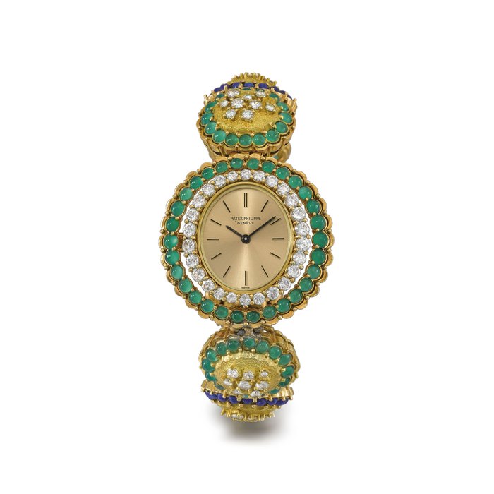PATEK PHILIPPE. A VERY FINE AND ATTRACTIVE, POSSIBLY UNIQUE 18K GOLD, DIAMOND, LAPIS LAZULI AND CHRYSOPRASE-SET BRACELET WATCH Signed Patek Philippe, Genève, ref. 4196/1, movement no. 1'244'957, case no. 2'679'868, manufactured in 1971