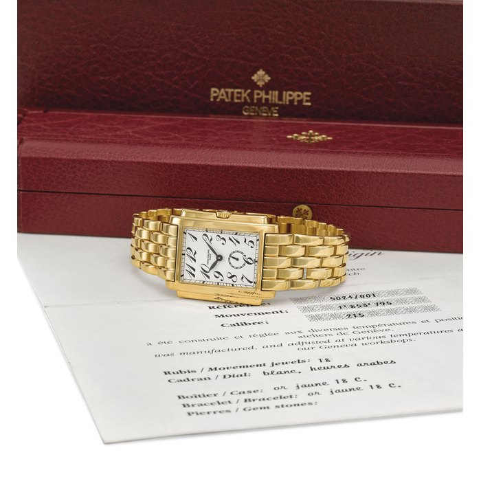 Patek Philippe. A very fine and large 18K gold rectangular wristwatch with bracelet, certificate and box Signed Patek Philippe, Genève, Gondolo model, ref. 5024/1, movement no. 1'853'795, case no. 2'952'511, circa 1997