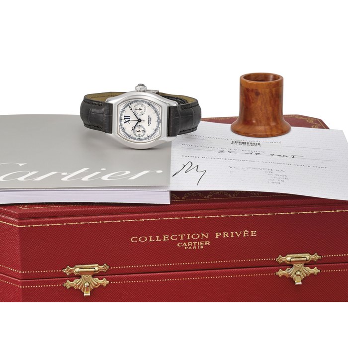 Cartier. A very fine 18K white gold single-button chronograph wristwatch with certificate and box Signed Cartier, Paris, Tortue Collection Privée Model, Ref. 2396, Case No. 0164CC, Circa 2005