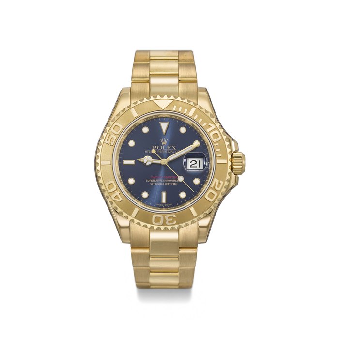 ROLEX. A FINE AND RARE 18K GOLD AUTOMATIC WRISTWATCH WITH SWEEP CENTRE SECONDS, DATE, BRACELET, BLUE DIAL, INTERNATIONAL GUARANTEE AND BOX SIGNED ROLEX, OYSTER PERPETUAL, YACHT-MASTER, REF. 16628B, CASE NO. V143217, CIRCA 2014