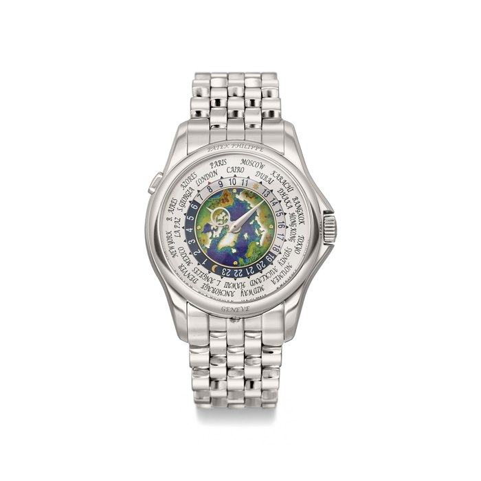PATEK PHILIPPE. A VERY FINE AND RARE PLATINUM AUTOMATIC WORLD TIME WRISTWATCH WITH "NORTH POLE" CLOISONNÉ ENAMEL DIAL, BRACELET, ORIGINAL CERTIFICATE AND BOX Signed Patek Philippe, Genève, Ref. 5131/1P, World Time, Movement No. 7’112’061, Case No. 6’224’459, circa 2018