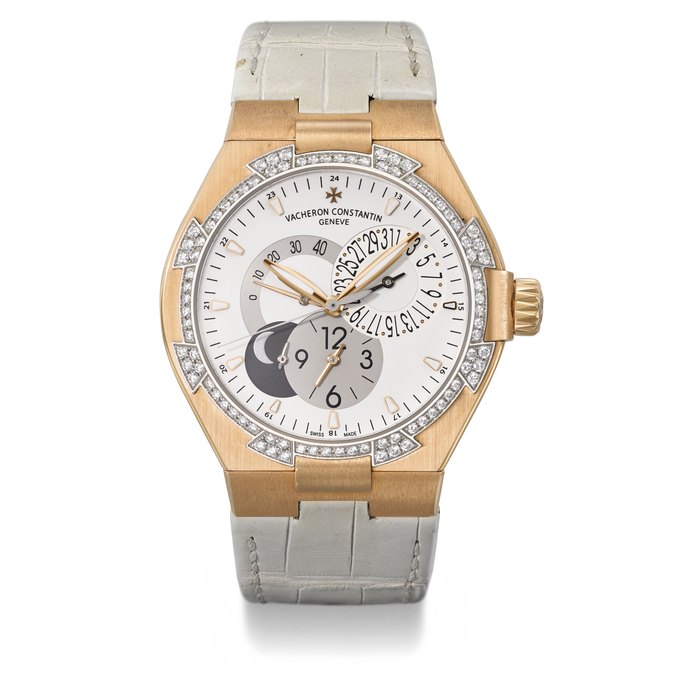 VACHERON CONSTANTIN. A FINE AND ATTRACTIVE 18K PINK GOLD AND DIAMOND-SET AUTOMATIC DUAL TIME WRISTWATCH WITH SWEEP CENTRE SECONDS, DATE, POWER RESERVE, DATE AND NIGHT INDICATOR AND CERTIFICATE OF ORIGIN SIGNED VACHERON & CONSTANTIN, GENÈVE, OVERSEAS DUAL TIME MODEL, REF. 47751, MOVEMENT NO. 5’156’519, CASE NO. 1’168’553, MANUFACTURED IN 2008