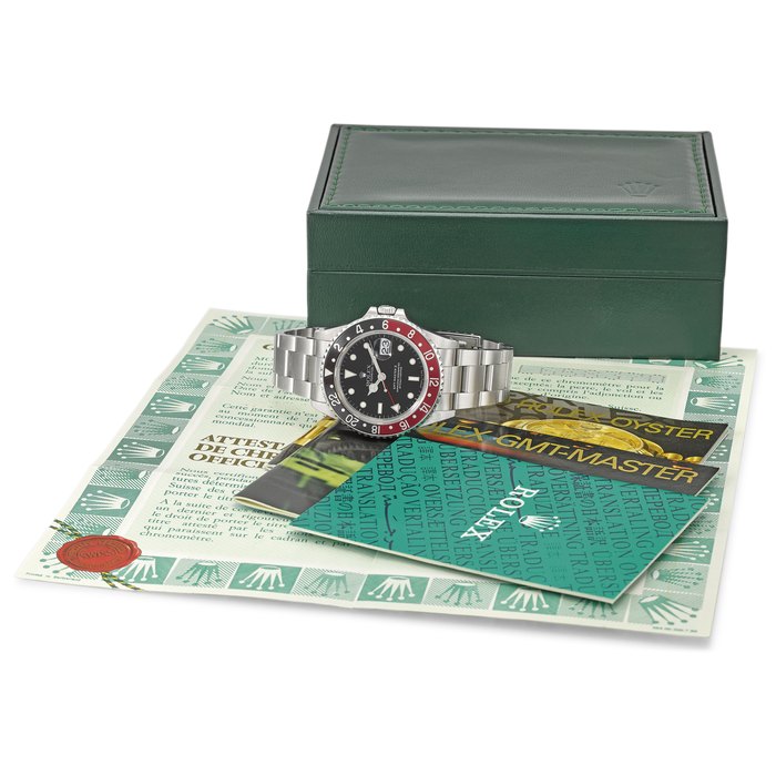 ROLEX. A RARE STAINLESS STEEL DUAL TIME AUTOMATIC WRISTWATCH WITH SWEEP CENTRE SECONDS, DATE, BRACELET, ORIGINAL GUARANTEE AND BOX SIGNED ROLEX, OYSTER PERPETUAL DATE, GMT-MASTER II, REF. 16710, CASE NO. L658370, CIRCA 1989