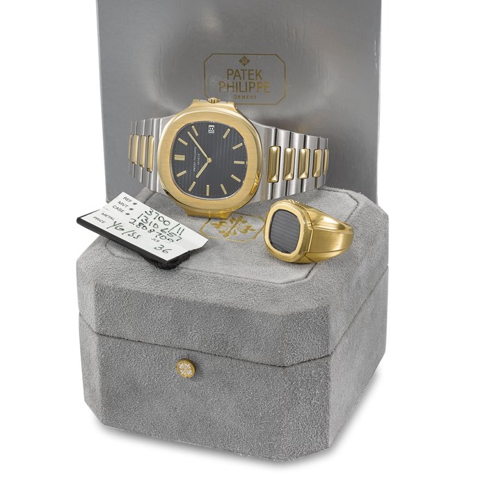 Patek Philippe. A very fine and rare 18K gold and stainless steel automatic wristwatch with date, bracelet, box and Patek Philippe heavy 18K gold Nautilus ring Signed Patek Philippe, Genève, ref. 3700/11 AJ, movement no. 1’310’657, case no. 2’808’709, manufactured in 1982