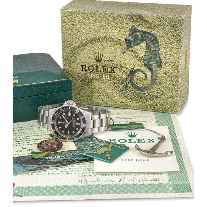 ROLEX. A RARE AND ATTRACTIVE STAINLESS STEEL AUTOMATIC WRISTWATCH WITH SWEEP CENTRE SECONDS, DATE, BRACELET, ROLEX OYSTER GUARANTEED 660FT/200M UNDER WATER ANCHOR, BLANK GUARANTEE AND BOX SIGNED ROLEX, OYSTER PERPETUAL DATE, SUBMARINER, 660FT= 200M, REF. 1680, CASE NO. 3’090’769, CIRCA 1972