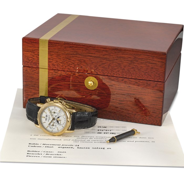 Patek Philippe. A very fine 18K gold perpetual calendar chronograph wristwatch with moon phases, 24 hour and leap year indication, duplicate Certificate of Origin, setting pin and box Signed Patek Philippe, Geneve, ref. 3970E, movement no. 876’615, case no. 2’934’666, manufactured in 1993