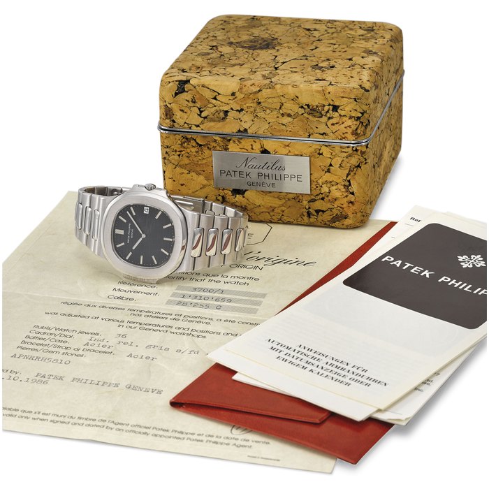 Patek Philippe. A fine and very rare stainless steel automatic wristwatch with date and bracelet, certificate of origin and cork box Signed Patek Philippe, ref. 3700/1, movement no. 1'310'659, case no. 538'561, manufactured in 1982