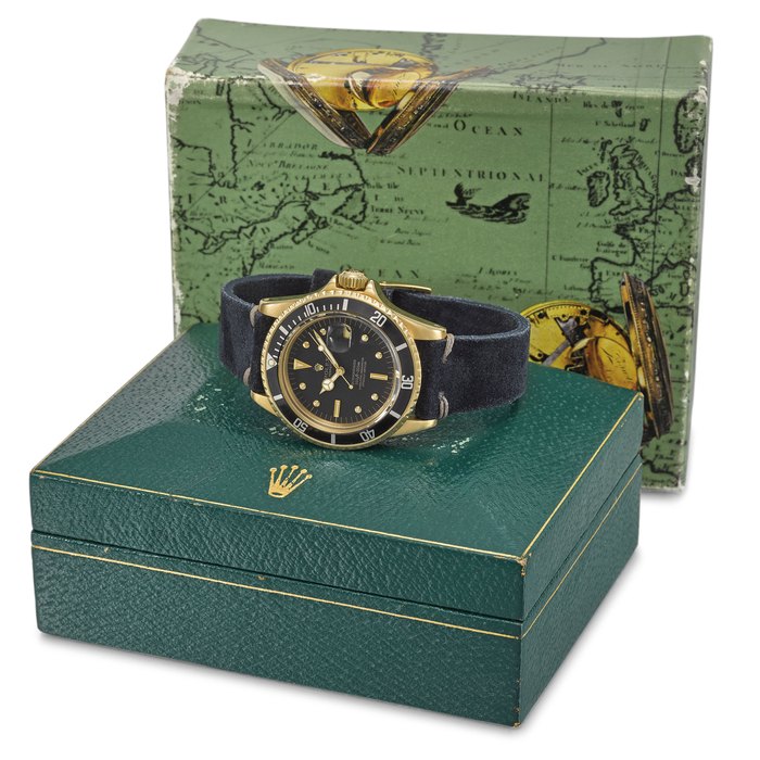 ROLEX. AN 18K GOLD AUTOMATIC WRISTWATCH WITH SWEEP CENTRE SECONDS, DATE AND BOX SIGNED ROLEX, OYSTER PERPETUAL DATE, SUBMARINER, 660FT=200M, REF. 1680, CASE NO. 2’412’946, CIRCA 1970