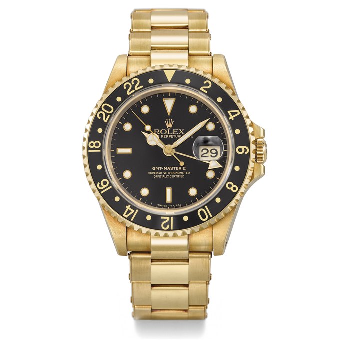 ROLEX. A FINE 18K GOLD AUTOMATIC DUAL TIME WRISTWATCH WITH SWEEP CENTRE SECONDS, DATE, BRACELET AND BOX SIGNED ROLEX, OYSTER PERPETUAL DATE, GMT-MASTER II, REF. 16718, CASE NO. L638927, CIRCA 1989