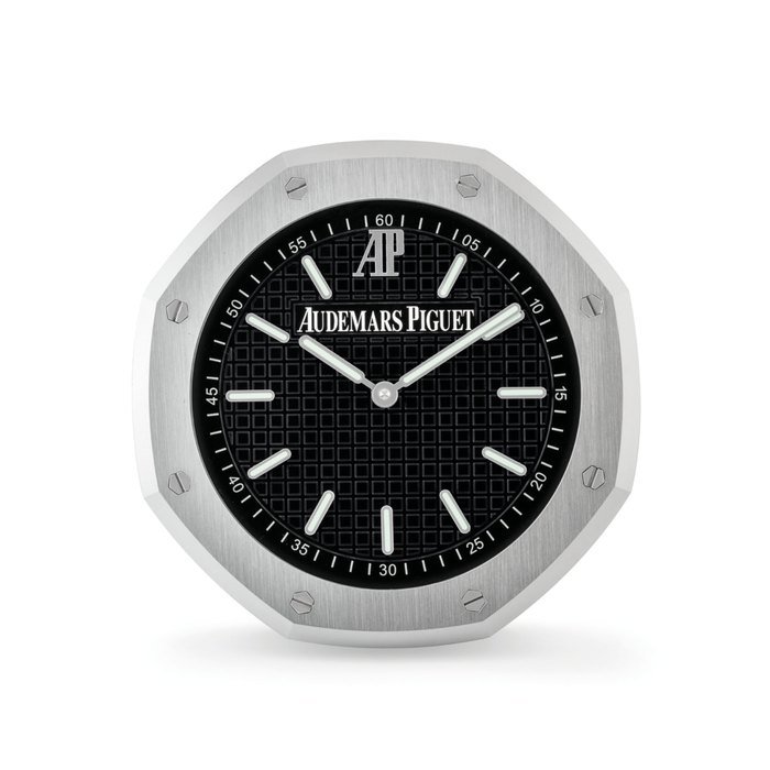 Audemars Piguet AUDEMARS PIGUET. AN UNUSUAL STAINLESS STEEL OCTAGONAL WALL CLOCK SIGNED AUDEMARS PIGUET, CIRCA 2000