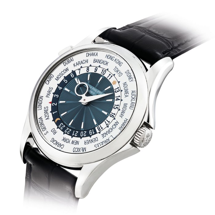 PATEK PHILIPPE. A FINE AND RARE PLATINUM AUTOMATIC WORLD TIME WRISTWATCH SIGNED PATEK PHILIPPE, REF. 5130, MOVEMENT NO. 5'625'877, CASE NO. 4'556'948, MANUFACTURED IN 2011