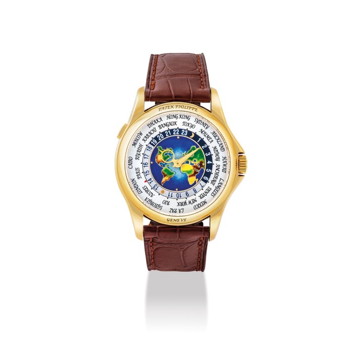 PATEK PHILIPPE. A FINE AND RARE 18K GOLD AUTOMATIC WORLD TIME WRISTWATCH WITH CLOISONNÉ ENAMEL DIAL SIGNED PATEK PHILIPPE, GENEVE, REF. 5131, MOVEMENT NO. 5'840'982, CASE NO. 6'016'256, CIRCA 2015