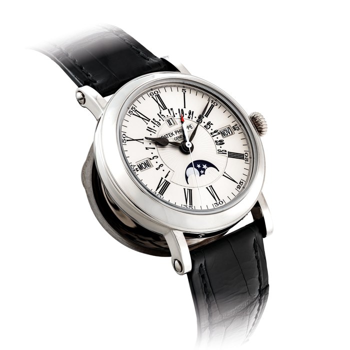 PATEK PHILIPPE. A FINE 18K WHITE GOLD AUTOMATIC PERPETUAL CALENDAR WRISTWATCH WITH SWEEP CENTRE SECONDS, RETROGRADE DATE, MOON PHASES AND LEAP YEAR INDICATION SIGNED PATEK PHILIPPE, GENEVE, REF. 5159, MOVEMENT NO. 5'556'929, CASE NO. 4'514'673, MANUFACTURED IN 2010