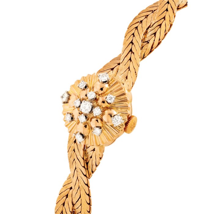PATEK PHILIPPE. A LADY'S FINE 18K PINK GOLD AND DIAMOND-SET BRACELET WATCH WITH CONCEALED DIAL SIGNED PATEK PHILIPPE, REF. 3205/74, MOVEMENT NO. 949'683, CASE NO. 697'909, MANUFACTURED IN 1958