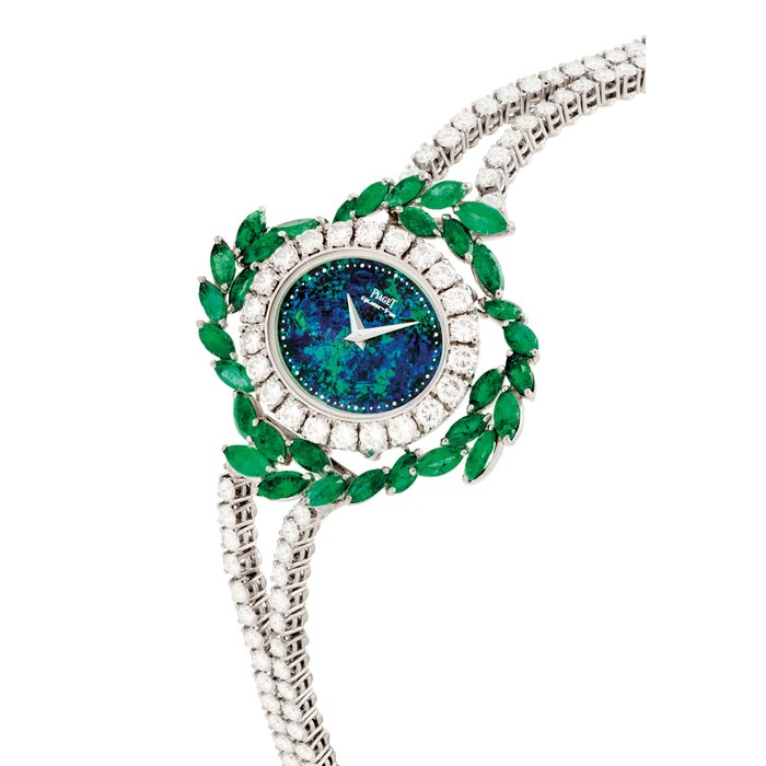 PIAGET. A LADY'S RARE AND HIGHLY ATTRACTIVE 18K WHITE GOLD DIAMOND AND EMERALD-SET BRACELET WATCH WITH OPAL DIAL SIGNED PIAGET, QUARTZ, CASE NO. 274,072, CIRCA 1990