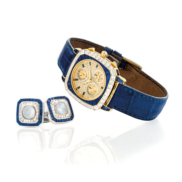 PIAGET AND ASPREY. A FINE AND UNIQUE 18K GOLD, DIAMOND AND SAPPHIRE-SET CUSHION-SHAPED CHRONOGRAPH WRISTWATCH WITH DATE, MOTHER-OF-PEARL CHAPTER RINGS AND A PAIR OF SIMILAR CUFFLINKS IN 18K WHITE GOLD WRISTWATCH SIGNED PIAGET, PIECE UNIQUE, REF. 14566, MOVEMENT NO. 9'412'776, CASE NO. 648'325, CIRCA 1996 AND CUFFLINKS SIGNED ASPREY, WITH DATE LETTER FOR 1997