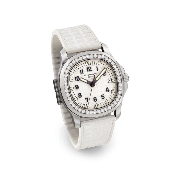 PATEK PHILIPPE. A LADY'S FINE STAINLESS STEEL AND DIAMOND-SET CUSHION-SHAPED WRISTWATCH WITH SWEEP CENTRE SECONDS AND DATE SIGNED PATEK PHILIPPE, AQUANAUT LUCE "PURE WHITE" MODEL, REF. 5067, MOVEMENT NO. 3'657'847, CASE NO. 4'853'296, MANUFACTURED IN 2008