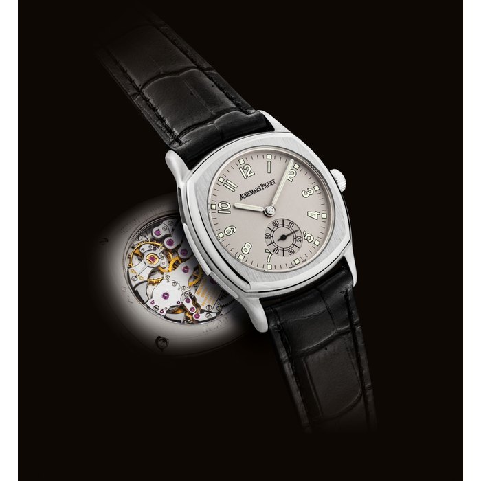 Audemars Piguet AUDEMARS PIGUET. A VERY FINE AND RARE PLATINUM CUSHION-SHAPED MINUTE REPEATING WRISTWATCH SIGNED AUDEMARS PIGUET, RÉPÉTITION MINUTES, JOHN SCHAEFFER MODEL, NO. 28, REF. 25882 PT, MOVEMENT NO. 445'590, CASE NO. D80727, CIRCA 1999, Price & Market Data