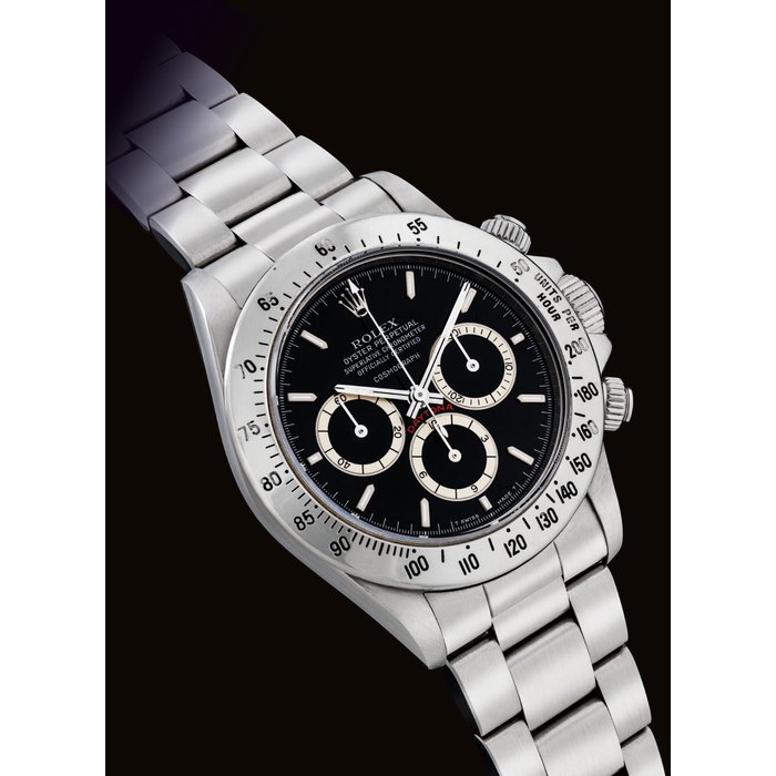 ROLEX. A VERY RARE AND FINE STAINLESS STEEL AUTOMATIC CHRONOGRAPH WRISTWATCH WITH BRACELET AND “ FLOATING ” COSMOGRAPH DIAL SIGNED ROLEX, OYSTER PERPETUAL, COSMOGRAPH DAYTONA MODEL, REF. 16520, CASE NO. L244781, CIRCA 1988