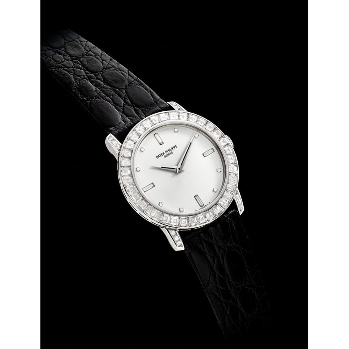 PATEK PHILIPPE. A FINE AND RARE PLATINUM AND DIAMOND-SET WRISTWATCH SIGNED PATEK PHILIPPE, REF. 5027, MOVEMENT NO. 1’820’880, CASE NO. 2’946’738, MANUFACTURED IN 1990