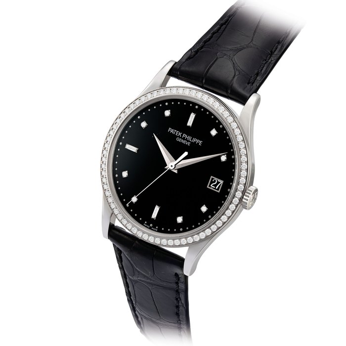 PATEK PHILIPPE. A FINE 18K WHITE GOLD AND DIAMOND-SET AUTOMATIC WRISTWATCH WITH SWEEP CENTRE SECONDS AND DATE SIGNED PATEK PHILIPPE, GENEVE, REF. 5297, MOVEMENT NO. 5'853'384, CASE NO. 6'031'606, CIRCA 2015