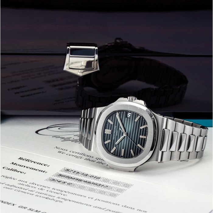 Patek Philippe PATEK PHILIPPE. A FINE STAINLESS STEEL AUTOMATIC WRISTWATCH WITH SWEEP CENTRE SECONDS, DATE AND BRACELET SIGNED PATEK PHILIPPE, GENEVE, NAUTILUS MODEL, REF. 5711, MOVEMENT NO. 5'680'456, CASE NO. 4'936'312, MANUFACTURED IN 2012, Price & Market Data